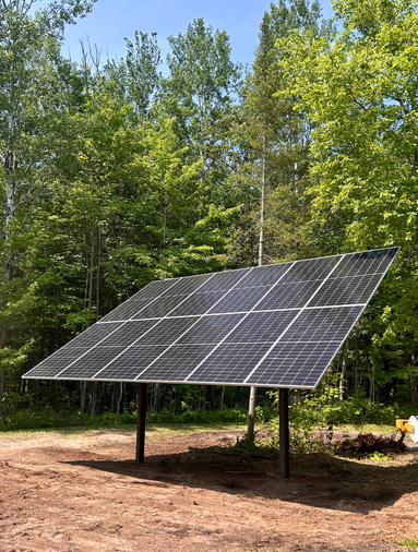 ground-mounted solar array for a remote cabin in Mackinac County in Michigan's Upper Peninsula