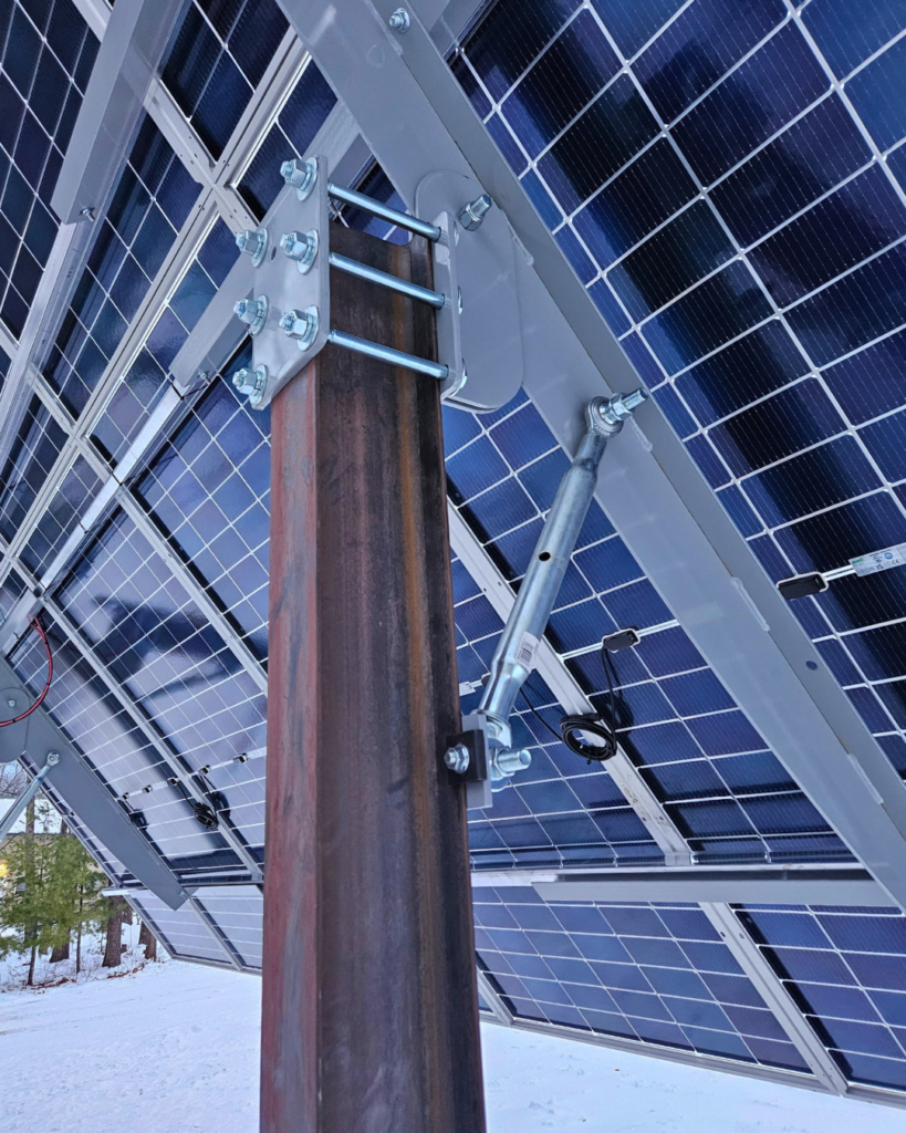 steel welded racking clamp – Peninsula Solar Welded steel racking clamp on a solar array foundation post
